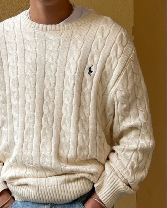 A guy wearing Ralph Lauren white sweatshirt logo navy blue 