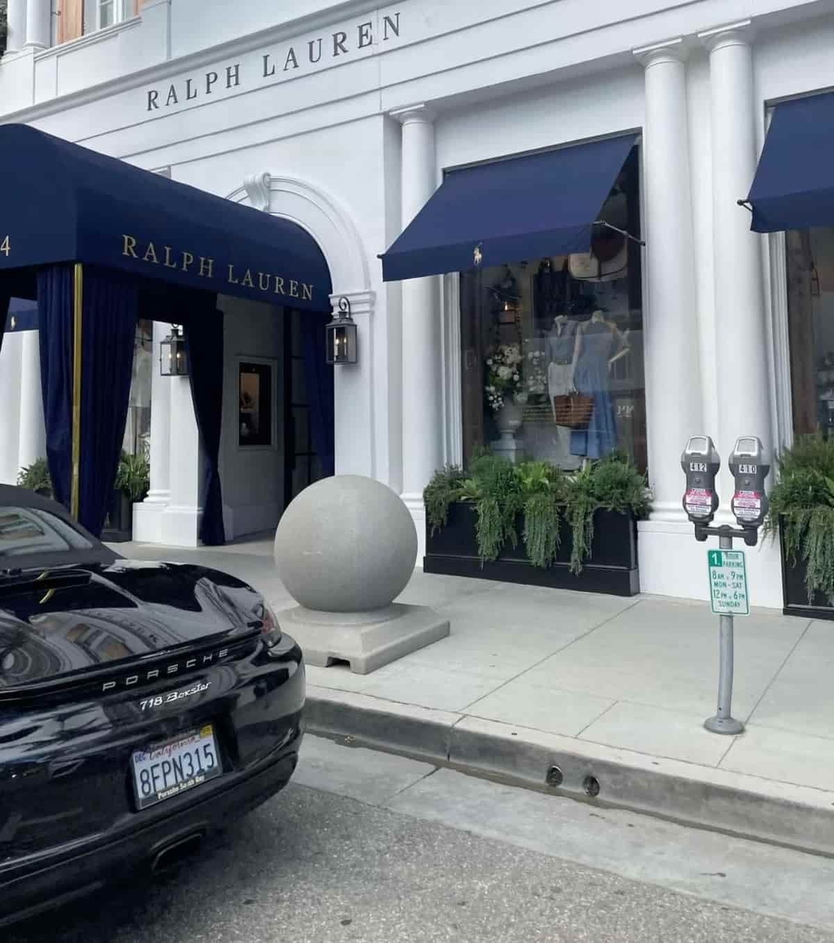 Ralph Lauren store storefront with cars parked on the street